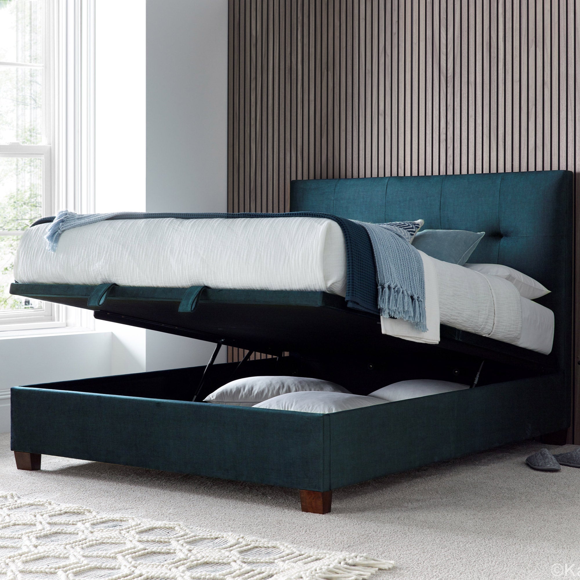 Nicola - Ottoman Bed Frame In Fabric Deep Ocean Blue 135cm (Double)